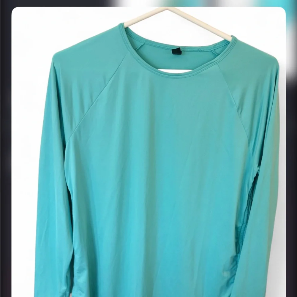 Under Armour Women's Long-Sleeve Performance Tee in Teal Blue - Picture 1 of 7